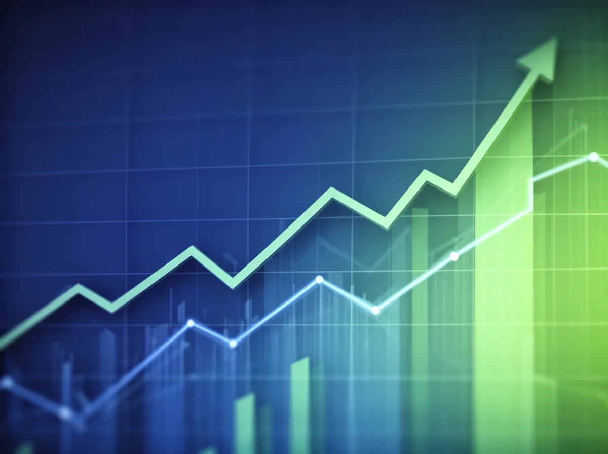 A digital graph with upward-trending lines and bar charts, representing growth or positive financial performance on a blue background.